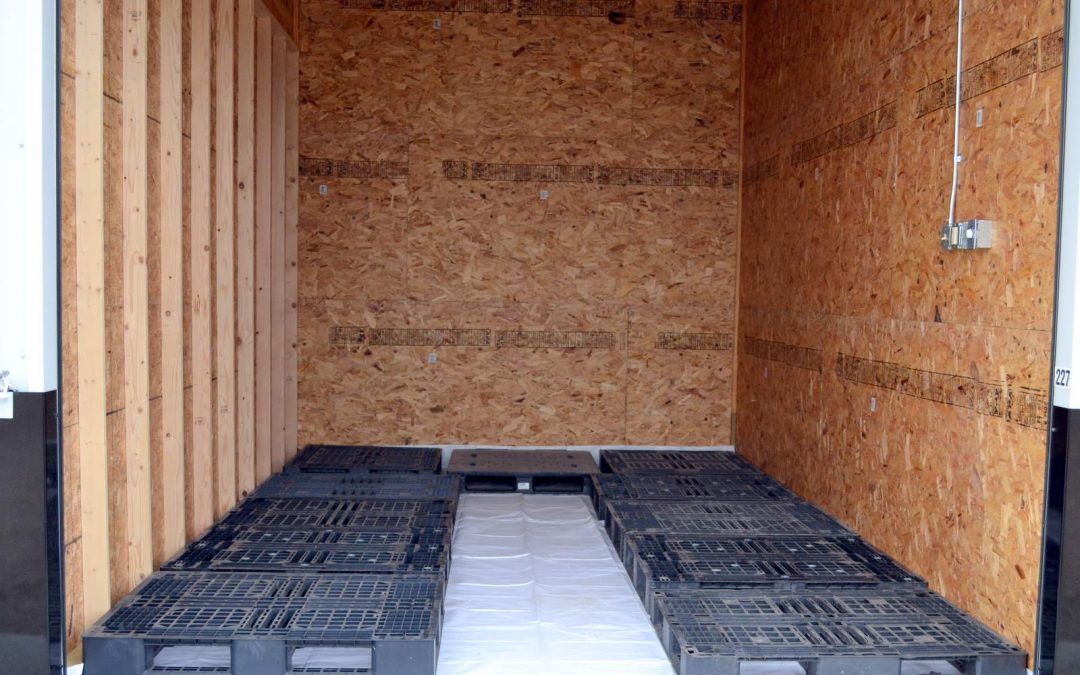 Optional vinyl floor liner and Optional plastic pallets